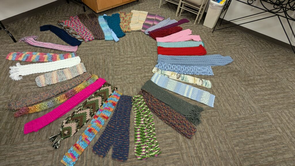 photo of 33 scarves arranged in a heart shape